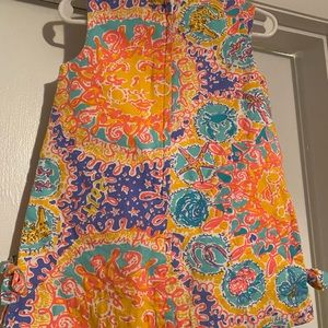 Girls Lilly shift “written in the sun” print dress